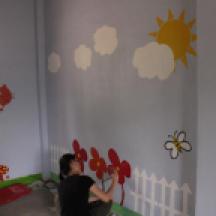 The satisfactory moment when all of the kids love their newly painted library.